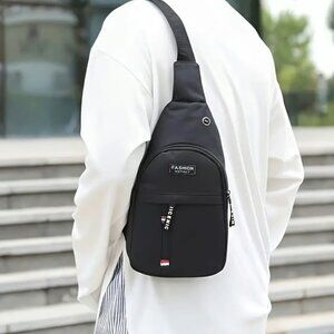 Fashion Instinct Black Sling Bag with adjustable strap NWOT